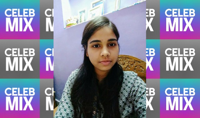 CelebMix logo background with Writer Ayushi posing