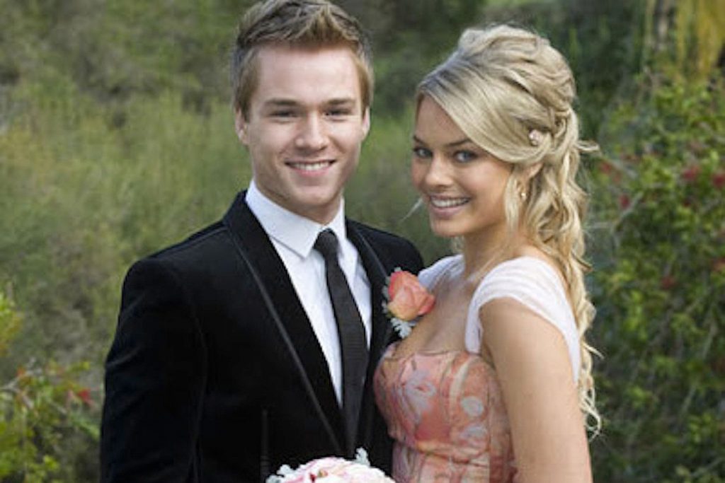 Sam Clark as Ringo Brown and Margot Robbie as Donna Freedman at their wedding in the Australian soap, Neighbours.