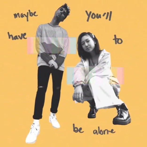 Yellow image displaying some of the lyrics from "Change" with Troy Ogletree standing in the middle and ÊMIA is crouching.