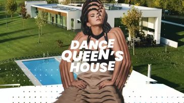 INNA posing with hands on hips wearing grey/brown trousers and a black bra with her head tilted up and to the right. In the background there is the pool and the house, and the words "Dance Queen's House" in white across INNA's chest.