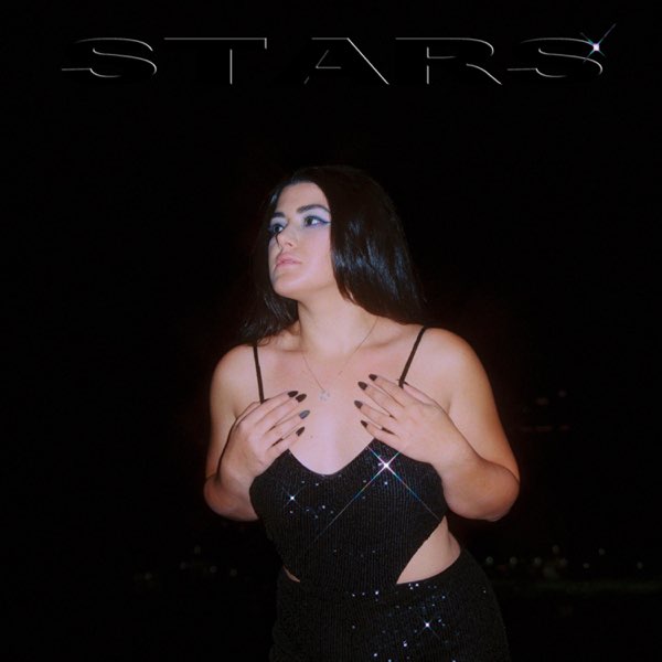 Single artwork for "Stars" by Leeza which sees her posing with her hands on her chest as her black hair falls behind her. She's wearing a black halter top.