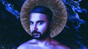 Single cover artwork for "The Free Ones" which sees I, Harappan shirtless with a purple tone over the picture with his head being embellished with a ray of golden light in a halo-like fashion.