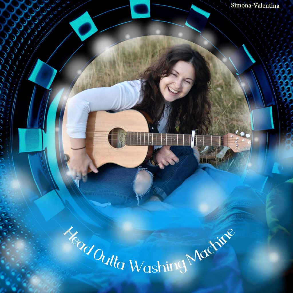 Single cover artwork for "Head Outta Washing Machine" which sees an image of Simona-Valentina in a field of grass holding her guitar under one arm and laughing at the camera held in a circular frame with spotlights around the circle. The rest of the frame is blue, in the style of a washing machine drum, with blue water floating by halfway up the image.