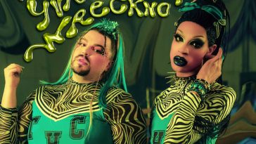 Official single cover artwork for "Topsy Turvy" which is green and sees Wreckno on the left and Yvie Oddly on the right, wearing green cheerleader outfits and slime-green wigs.