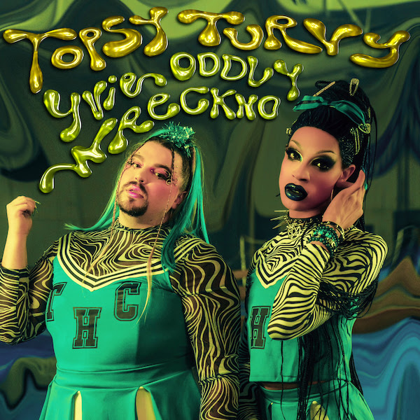 Official single cover artwork for "Topsy Turvy" which is green and sees Wreckno on the left and Yvie Oddly on the right, wearing green cheerleader outfits and slime-green wigs.