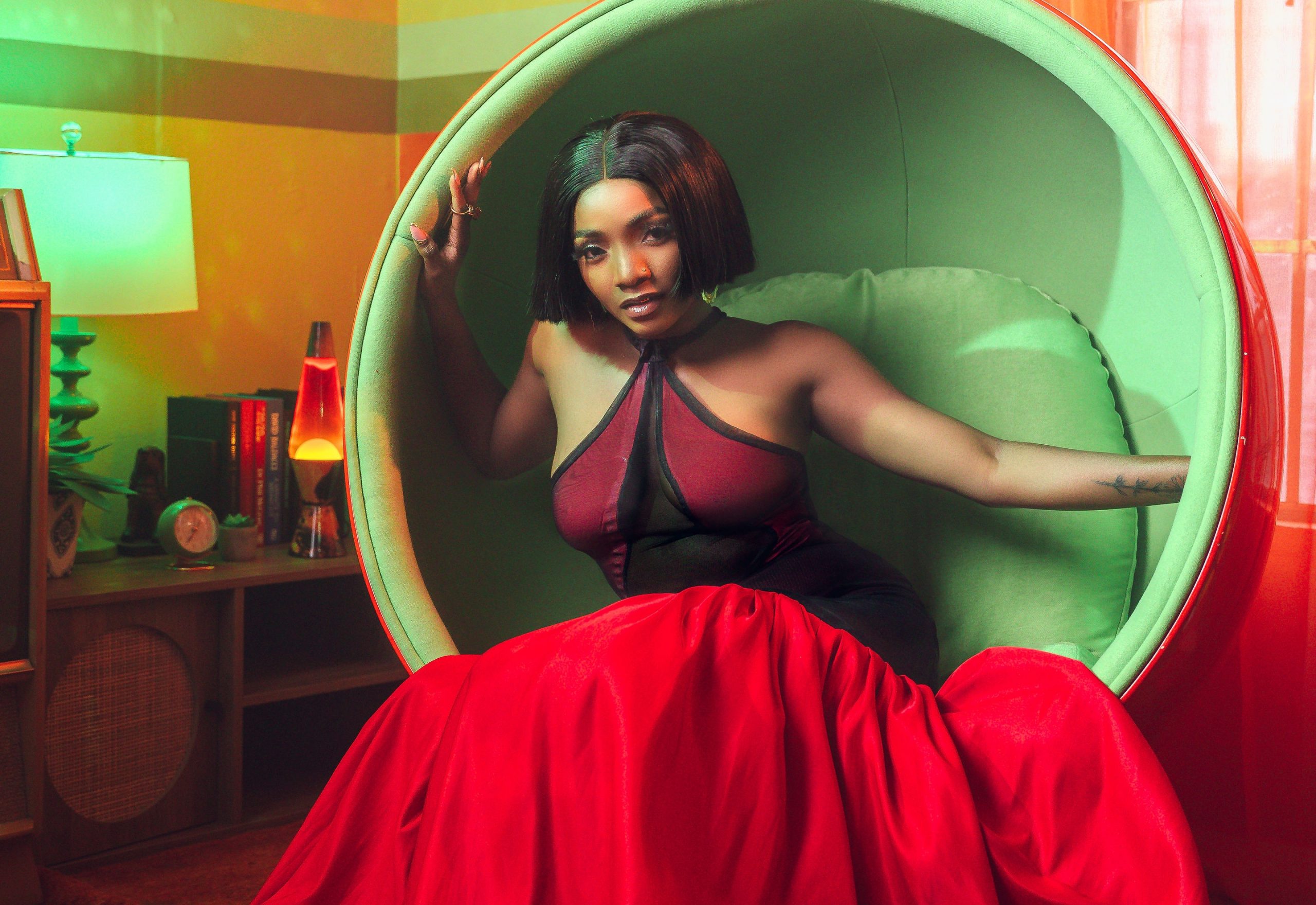 Woman' Lyrics By Simi, Official Lyrics