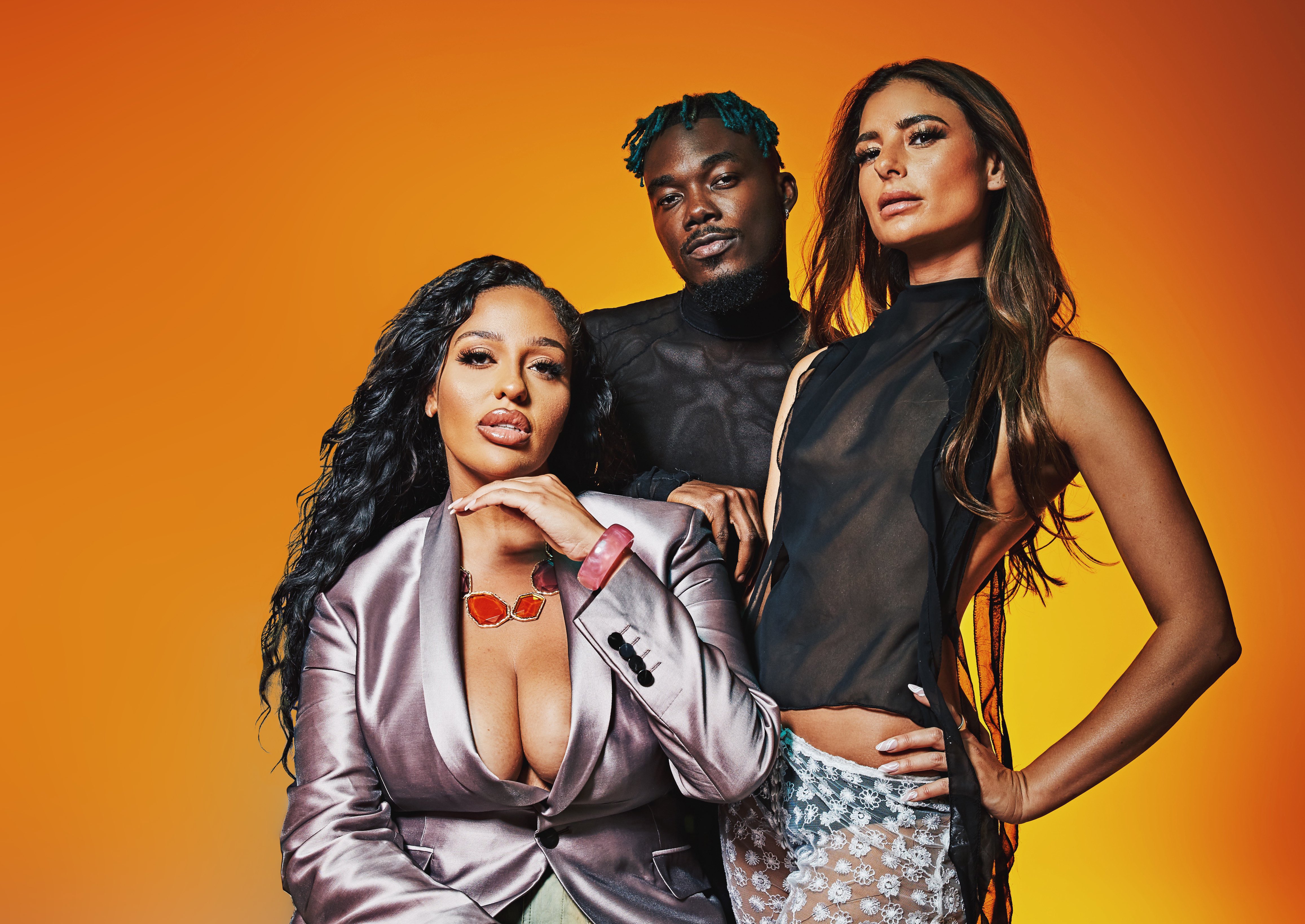 Promotional photo for "Taxi Man" in collaboration with Vybz Kartel which sees Camidoh posing behind Miss Ladamilia and DJ Lara Fraser.